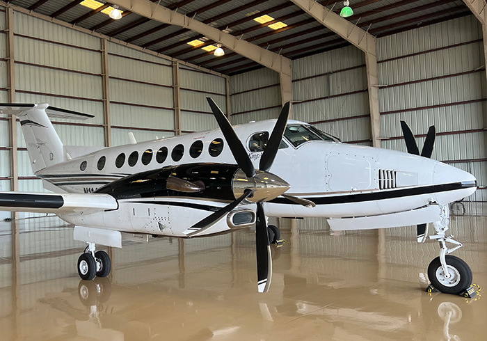 Propeller plane in hangar